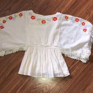 BRAND NEW GIRLS SHIRT SIZE 4-5. NEW WITHOUT TAGS ON IT. SMOKE FREE HOME.